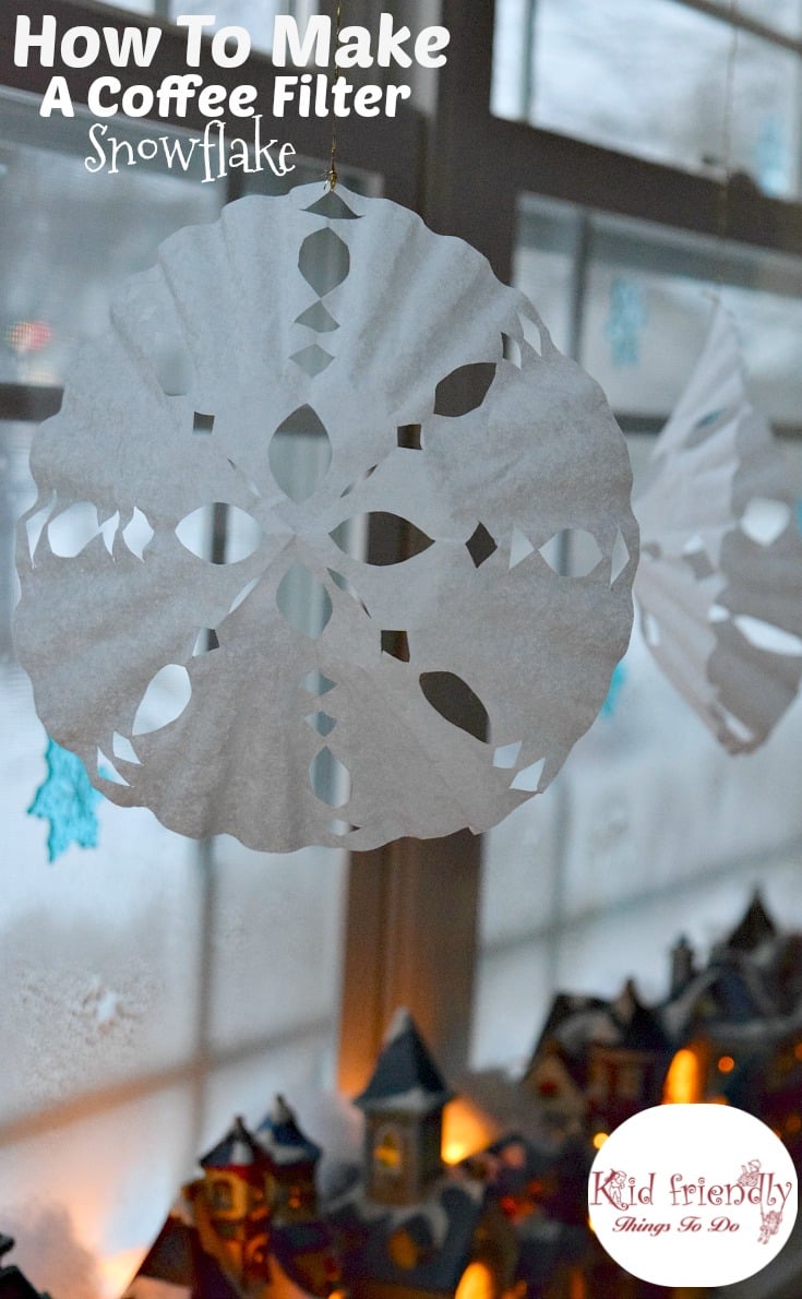 Great winter craft. These are easy to make with the kids! How to make a coffee filter snowflake. Fun to do on a snow day! www.kidfriendlythingstodo.com