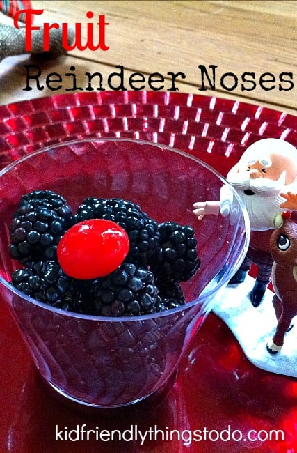 A non-candy Holiday Fruit Cup of Reindeer Noses with one sweet treat for a Rudolph Nose! Fun idea for Christmas parties with kids!