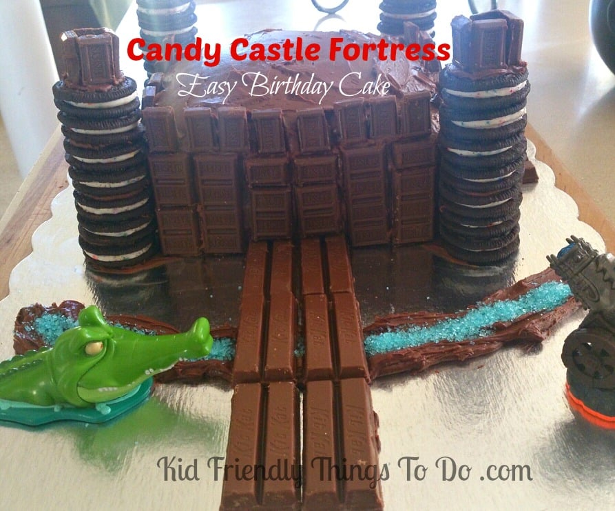 A Cool Candy Fortress Castle Cake decorated with Hershey Bars, Oreo Cookies, and Kit-Kat Bars! This is so simple to make and the kids love this!