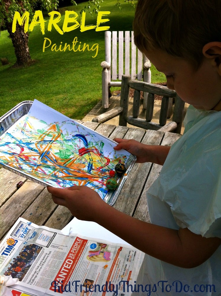 Marbles are so much fun!  Painting with marbles is even more fun for kids! We used plastic spoons, Dixie Cups, and disposable cake pans for easy clean up, too!