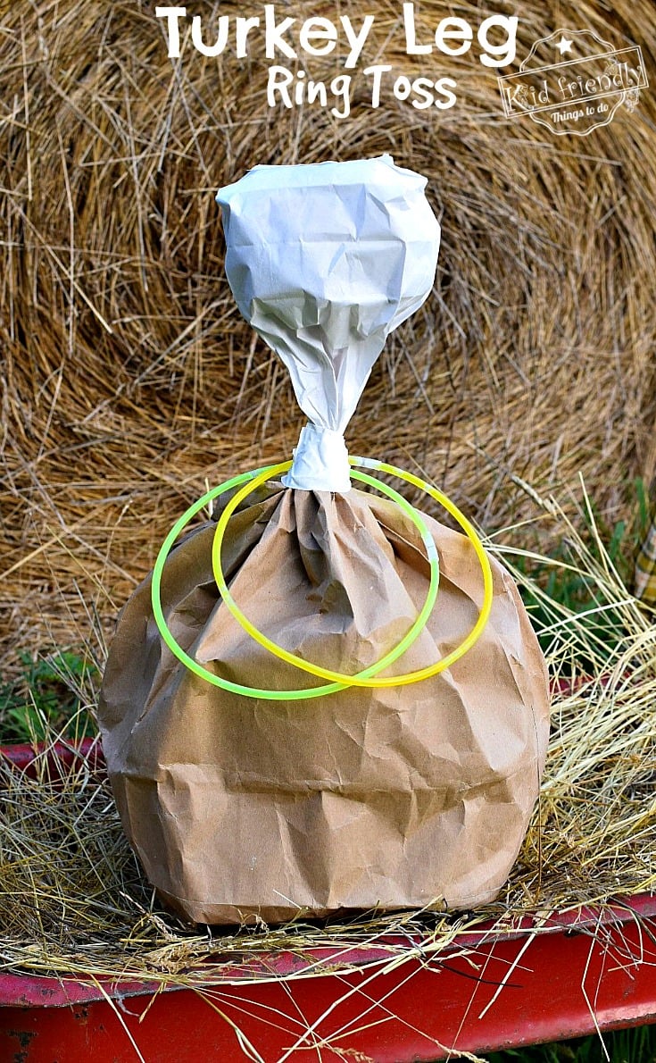 Turkey Leg Ring Toss Thanksgiving Game for Kids and Family - Use glow in the dark necklaces for night time fun! Perfect for preschool and elementary school parties. It's so easy to make and fun for everyone! fall and harvest party idea - www.kidfriendlythingstodo.com