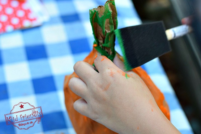 Easy and Fun Paper Bag Pumpkin Craft for Kids to Make - DIY Perfect for preschool or elementary school fall and Halloween crafts - www.kidfriendlythingstodo.com