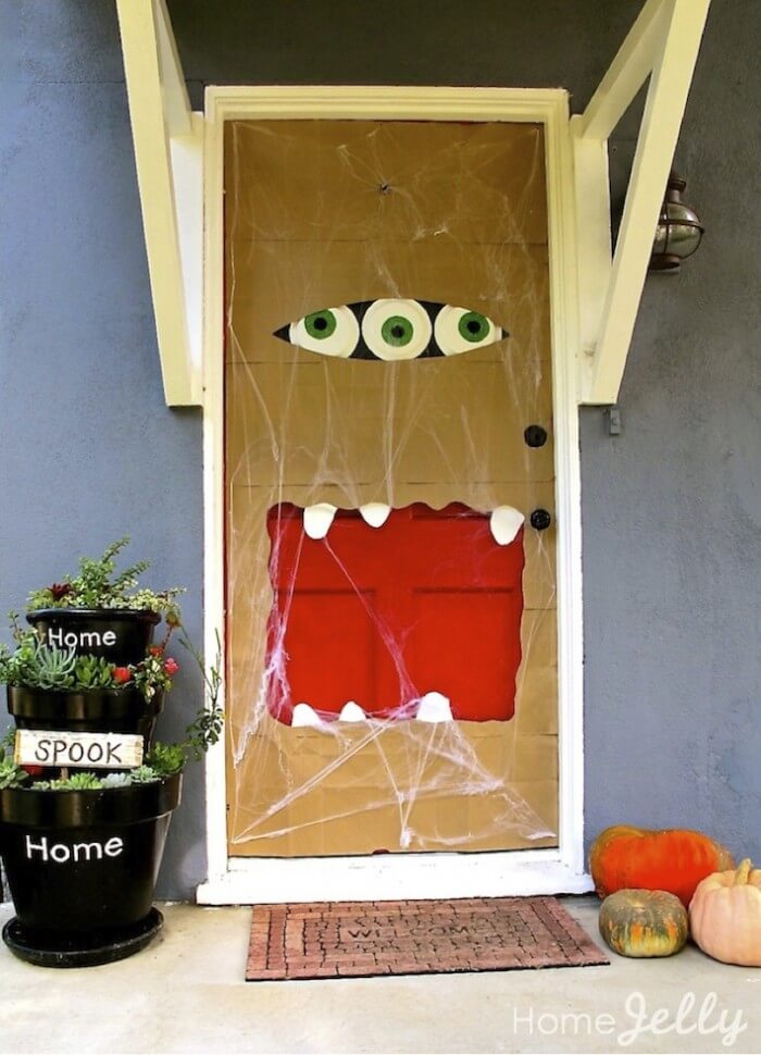 Over 17 Super Fun Halloween Themed Front Door and Porch Ideas - Fun DIY Decorations for Halloween - www.kidfriendlythingstodo.com