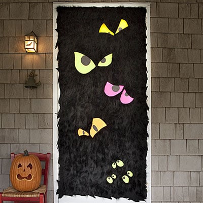 Over 17 Super Fun Halloween Themed Front Door and Porch Ideas - Fun DIY Decorations for Halloween - www.kidfriendlythingstodo.com
