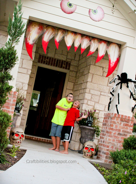 Over 17 Super Fun Halloween Themed Front Door and Porch Ideas - Fun DIY Decorations for Halloween - www.kidfriendlythingstodo.com