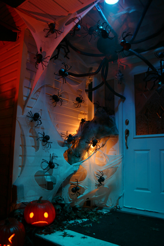 Over 17 Super Fun Halloween Themed Front Door and Porch Ideas - Fun DIY Decorations for Halloween - www.kidfriendlythingstodo.com