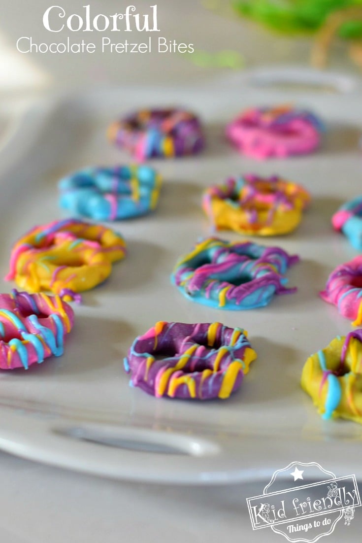 Easy and Colorful Spring Chocolate Covered Pretzel Bite Treats - The perfect salty sweet & yummy treat for Spring, Easter and Mother's Day! White chocolate covered pretzels that are so yummy and fun for the kids to help make and eat - www.kidfriendlythingstodo.com 