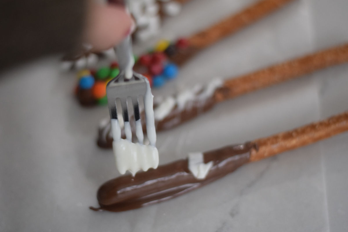 making chocolate covered pretzels 