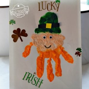 An Adorable Puffy Paint Leprechaun Handprint Leprechaun { A St. Patrick’s Day Craft} | Kid Friendly Thing To Do