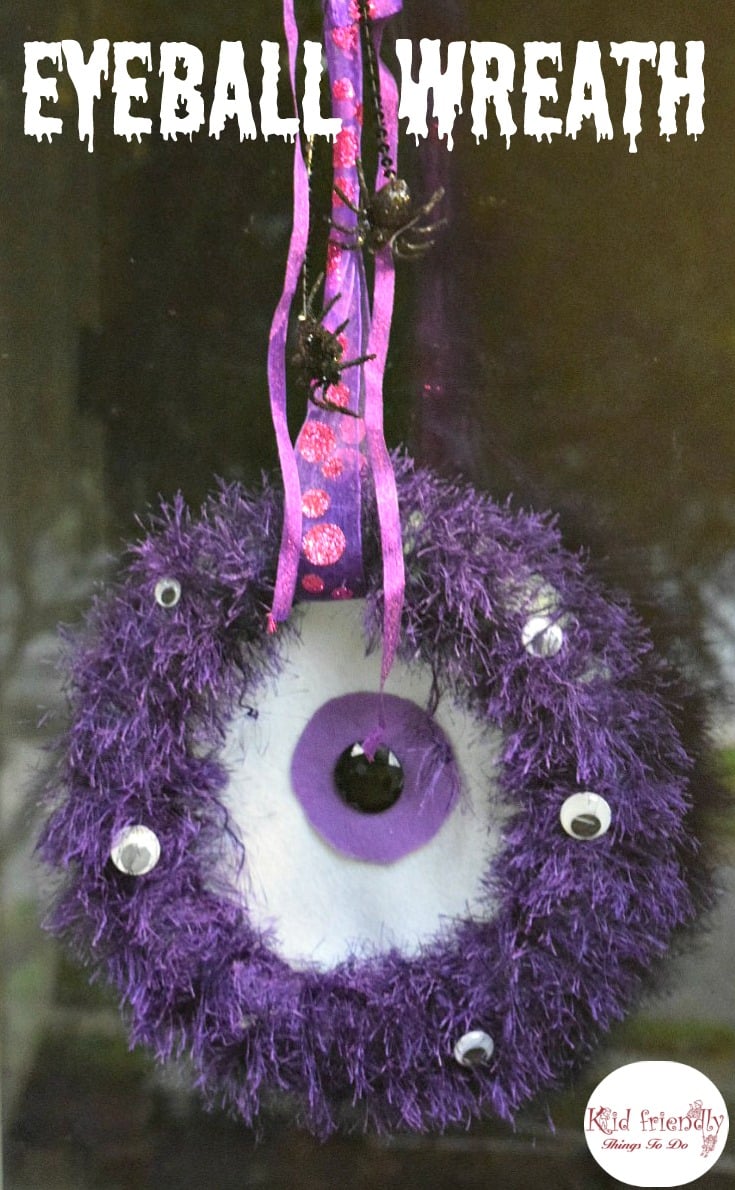 A DIY One-eyed Monster Wreath for Halloween - easy to make and so cute as a Halloween decoration - www.kidfriendlythingstodo.com