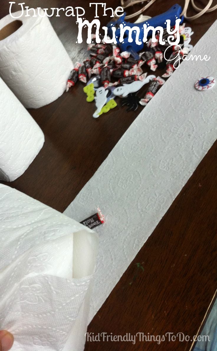 Unwrap the Mummy Game! Perfect for Preschool or Elementary School Halloween parties, or Hotel Transylvania Birthday Parties. You won't believe how easy this is, and how much the kids love unwrapping the toilet paper to find cute prizes! 