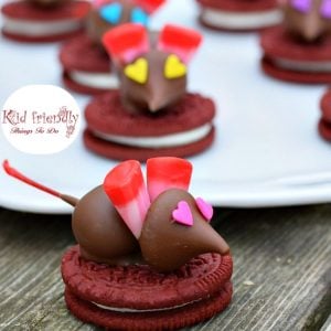 Chocolate Covered Cherry Valentine Mice On A Red Velvet Oreo Cookie