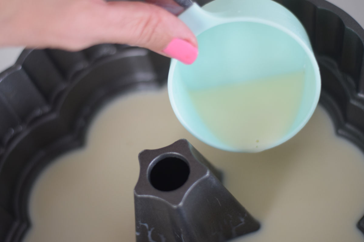 pouring white Jell-O into mold