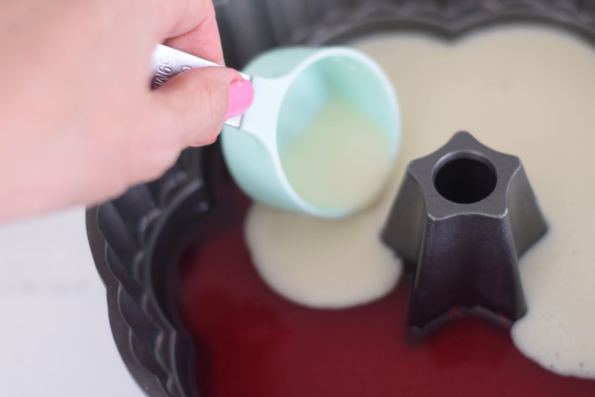 pouring white Jell-O into mold 