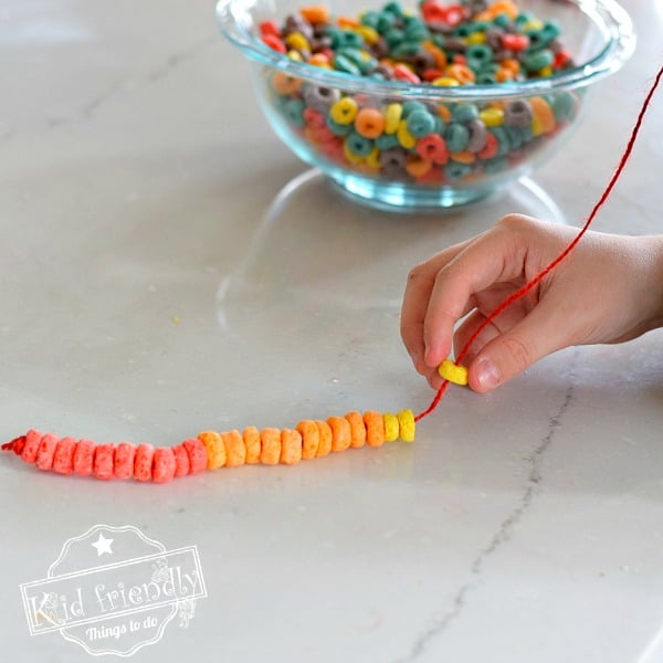 making a fruit loop necklace with kids