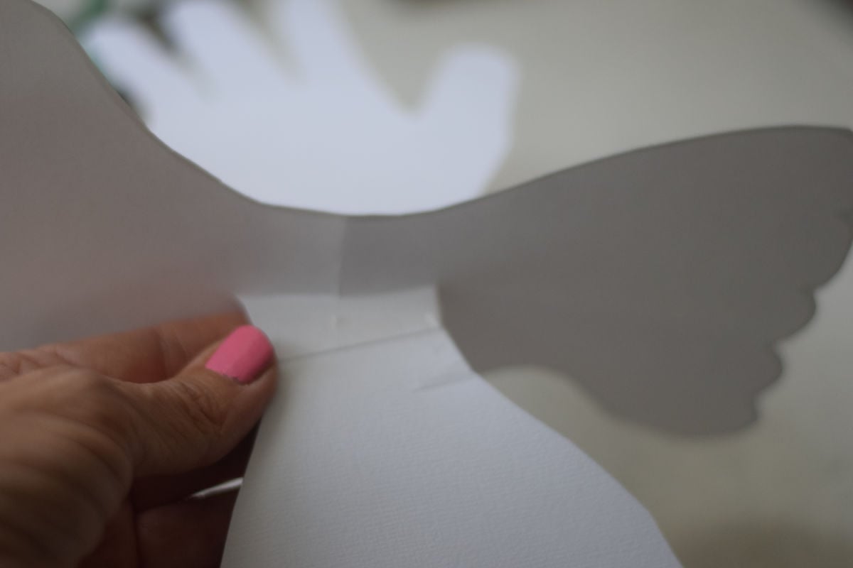 making dove craft with handprints 
