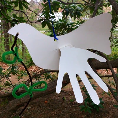 A Dove Craft With Child Hand Prints For Wings