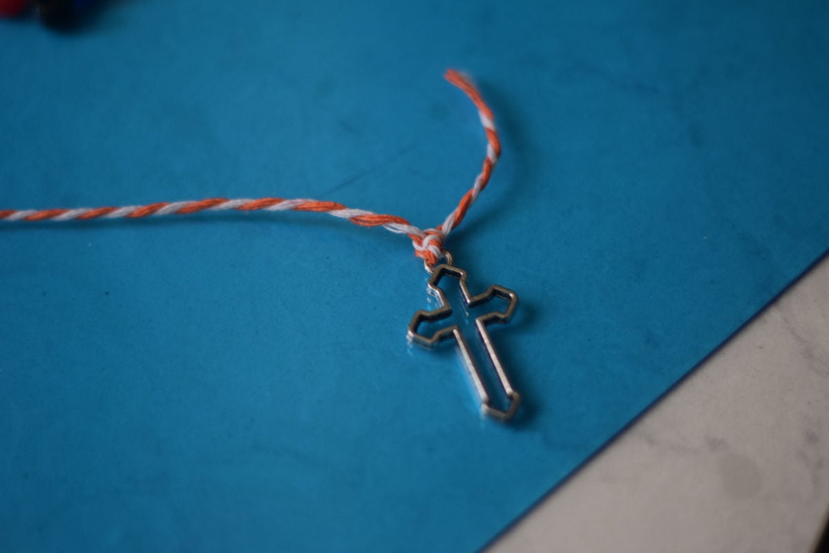 cross pendant on prayer beads 