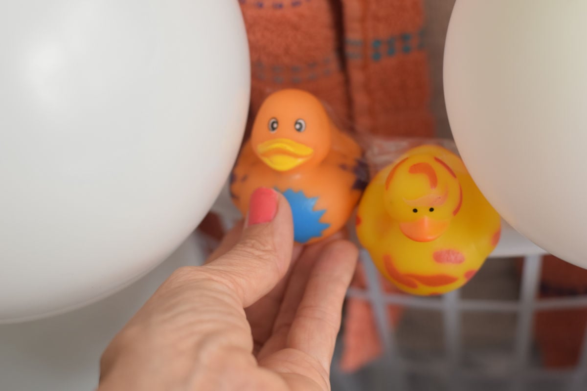 adding rubber ducks to bubble bath costume 