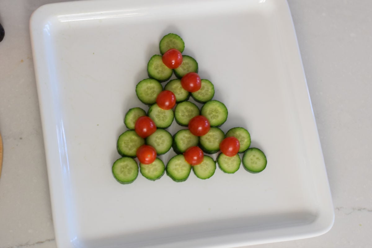 veggie Christmas tree of cucumbers and tomatoes 