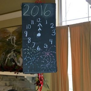New Years Eve With Kids! DIY Pull String Pinata to release Kisses at Midnight - KidFriendlyThingsToDo.com