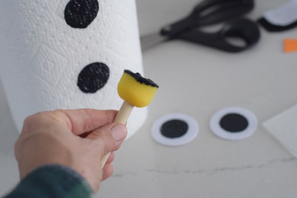 making olaf eyes for bowling game 