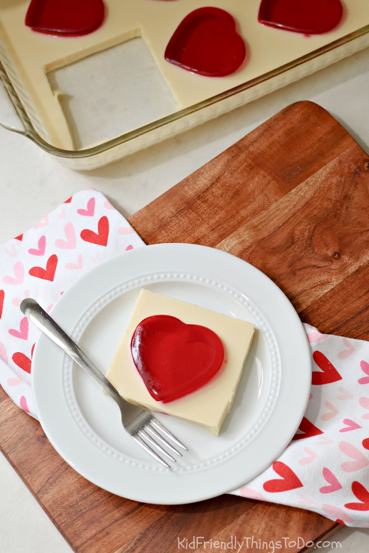 red Jello heart squares dessert with white Jello