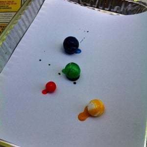 Marbles are so much fun! Painting with marbles is even more fun for kids! We used plastic spoons, Dixie Cups, and disposable cake pans for easy clean up, too!