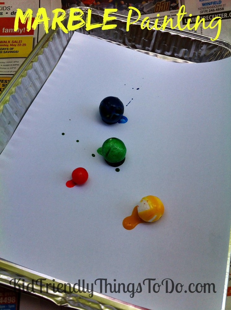Marbles are so much fun! Painting with marbles is even more fun for kids! We used plastic spoons, Dixie Cups, and disposable cake pans for easy clean up, too!