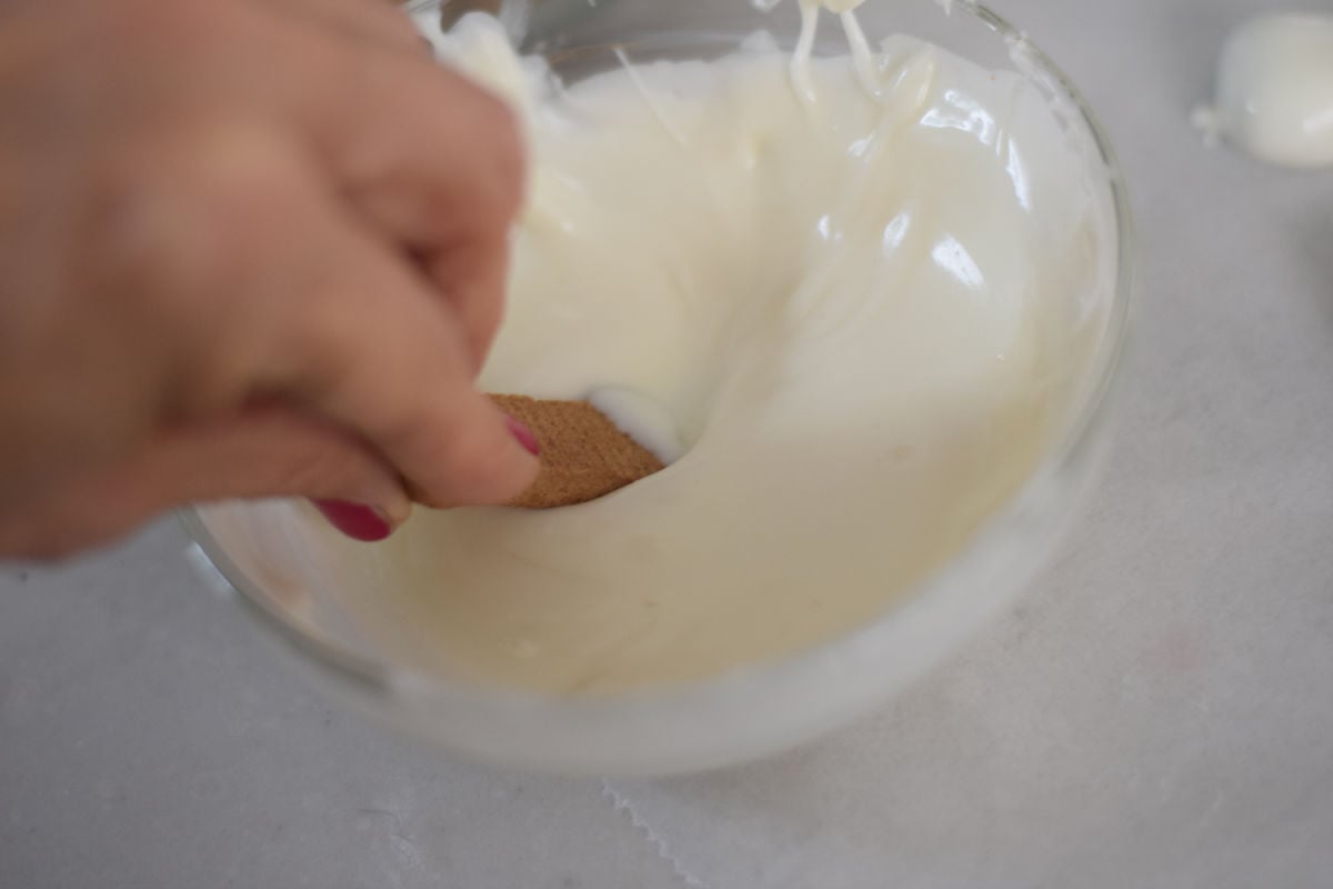 dipping Scooby snacks into chocolate