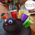 Make a Snack Turkey for the kids at Thanksgiving for an easy and cute table decoration and craft - www.kidfriendlythingstodo.com