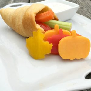 Crescent Roll Cornucopia filled with Vegetables and served with ranch dip! Yum and Fun! - KidFriendlyThingsToDo.com