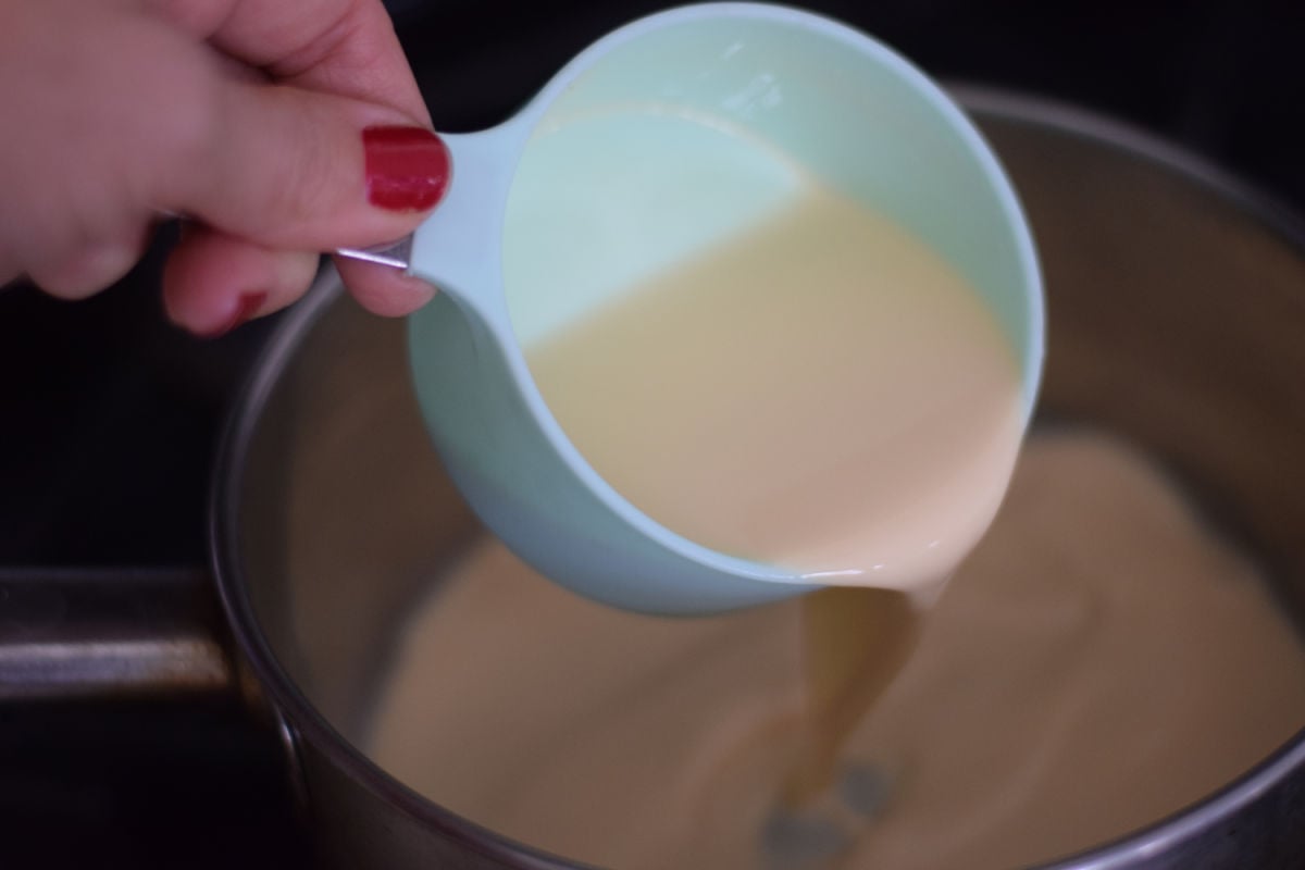 pouring milk for fudge 