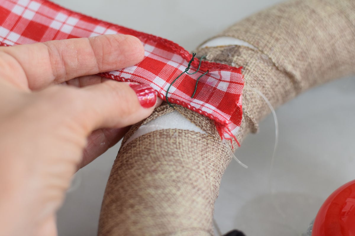 attaching ribbon to wreath