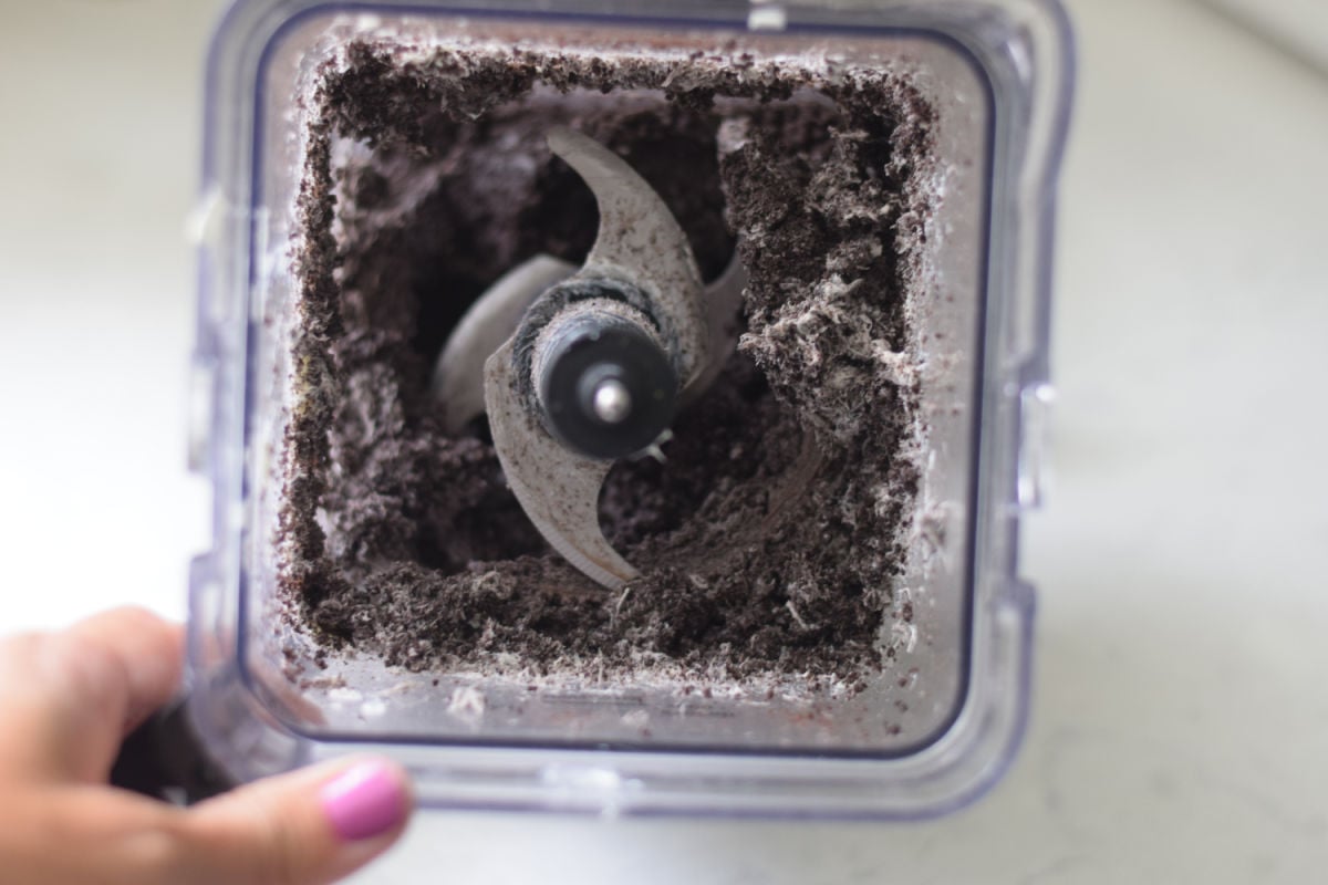 making Oreo Truffle layer ice cream cake 