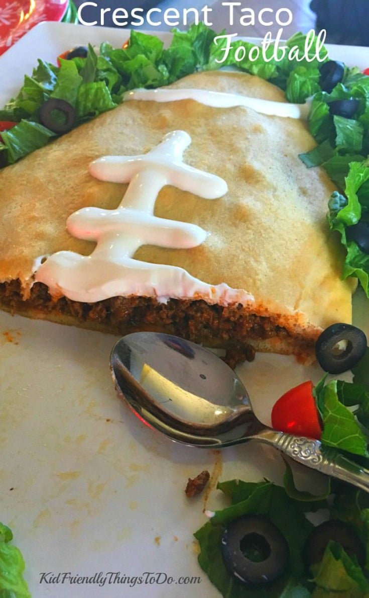 Football shaped Crescent Taco. Perfect for football parties. Easy and delicious. www.kidfriendlythingstodo.com