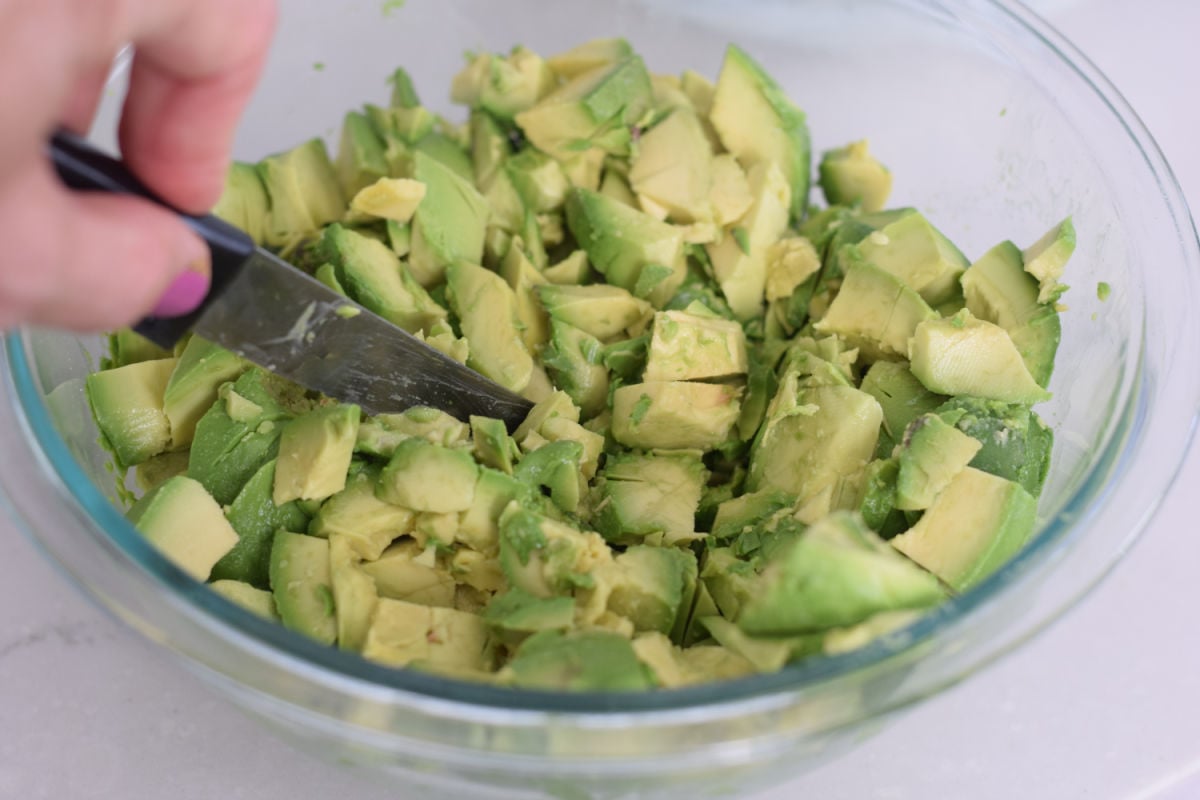 chopping avocados for guacamole