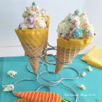 Adorable and Fun! Bunny Bait Munch made from Sea Salt Popcorn with Coconut, Candy and White Chocolate in a fun Chocolate Dipped Waffle Cone - Seriously fun and yummy for Easter or Spring Kid Parties! - KidFriendlyThingsToDo.com