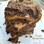 Chewy, Gooey, Loaded Turtle Cake Brownies - Easy to make. Oozing with caramel and tons of chocolate! The best! KidFriendlyThingsToDo.com