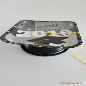 Easy DIY Graduation Cap For Kids Craft - So simple to make and looks a lot like the real thing! KidFriendlyThingsToDo.com