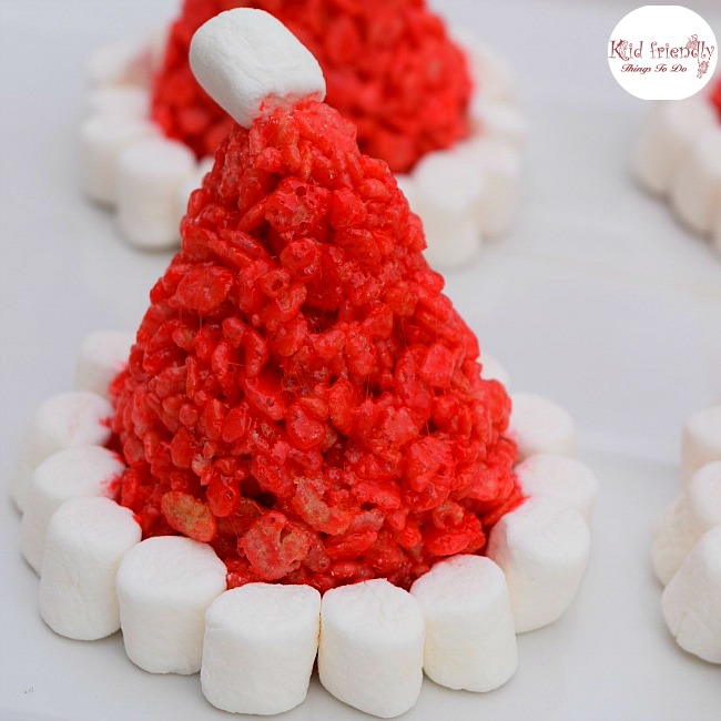Santa Hat Rice Krispies Treats for a Fun and Simple Christmas Treat - Perfect for holiday parties with kids! www.kidfriendlythingstodo.com