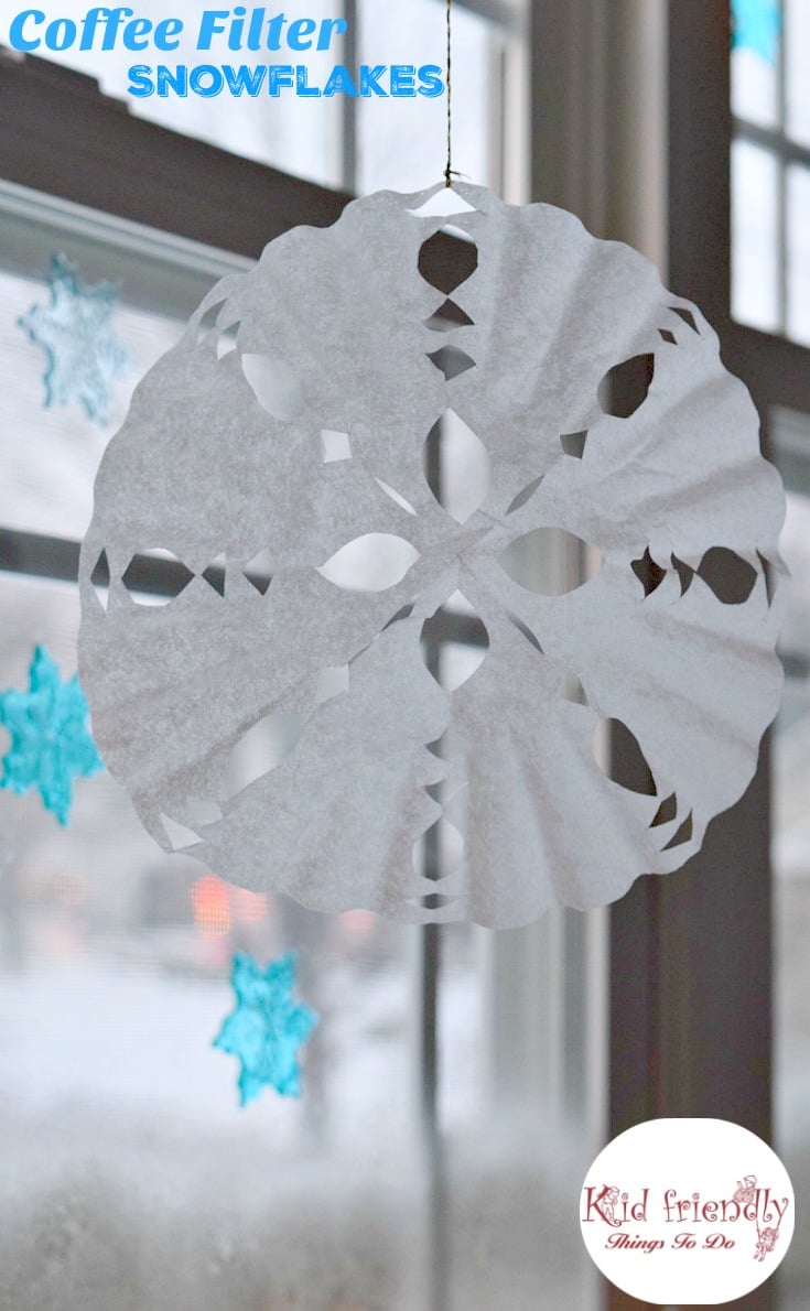 Great winter craft. These are easy to make with the kids! How to make a coffee filter snowflake. Fun to do on a snow day! www.kidfriendlythingstodo.com