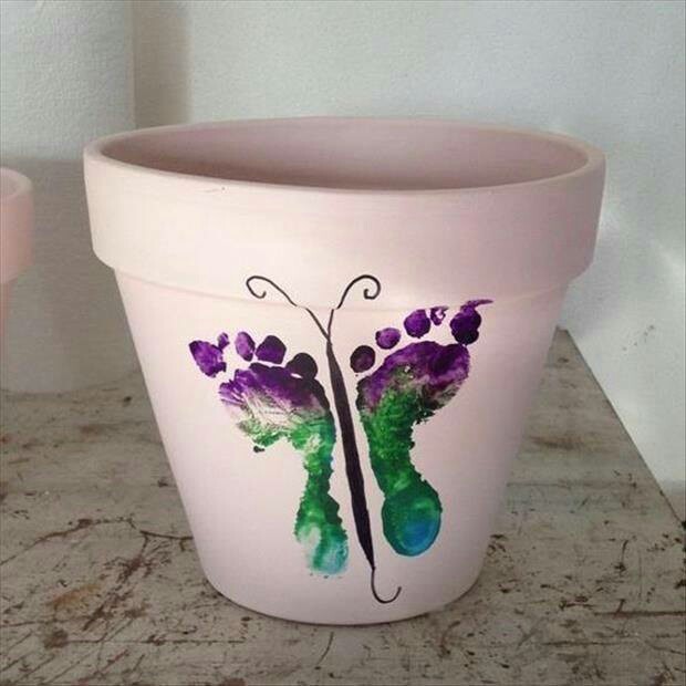 butterfly footprint clay pot
