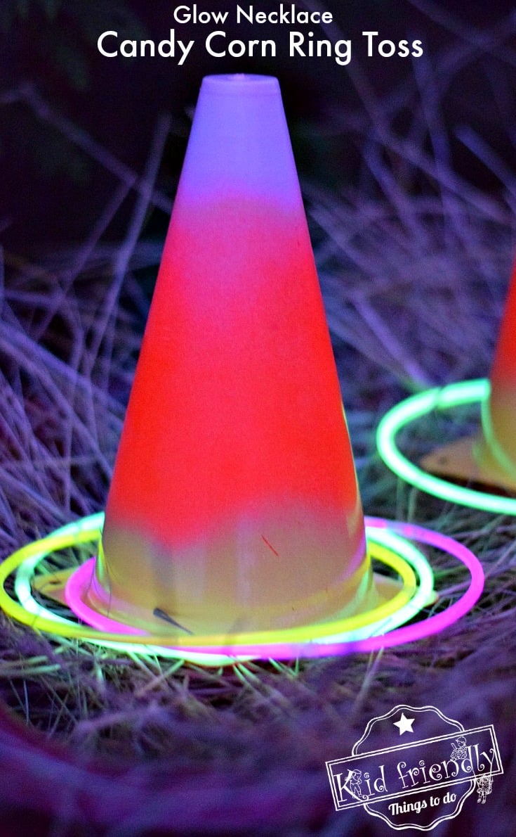 Easy DIY Candy Corn Ring Toss with Glow Necklaces for a Fun Fall, Halloween, or Thanksgiving Game - perfect for kid's school party, harvest parties, or family fun! www.kidfriendlythingstodo.com