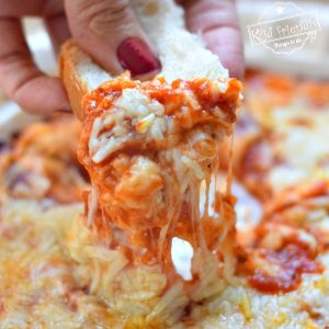 Classic Quick and Easy Hot Pizza Dip Recipe With Cream Cheese - Perfect appetizer for game days, holidays and crustless pizza fixes - www.kidfriendlythingstodo.com