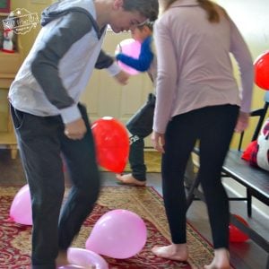 Valentine Balloon Stomp Word Scramble Game - A Fun Game for Kid or Teen Parties - So easy to set up and kids love it! www.kidfriendlythingstodo.com