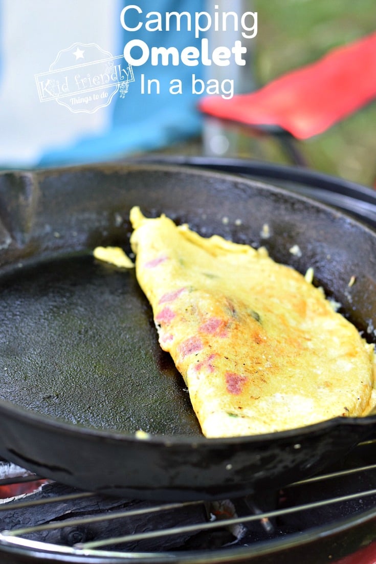 Omelet cooking over campfire from Omelet in a Bag
