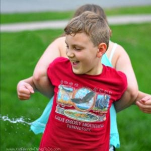 summer fun relay game for kids with water balloons