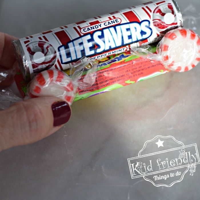 Adding peppermint to the candy train craft 