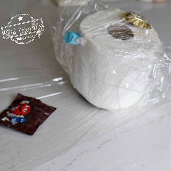 Saran Wrap Candy Ball Game for Holiday School Parties - Arts and Bricks